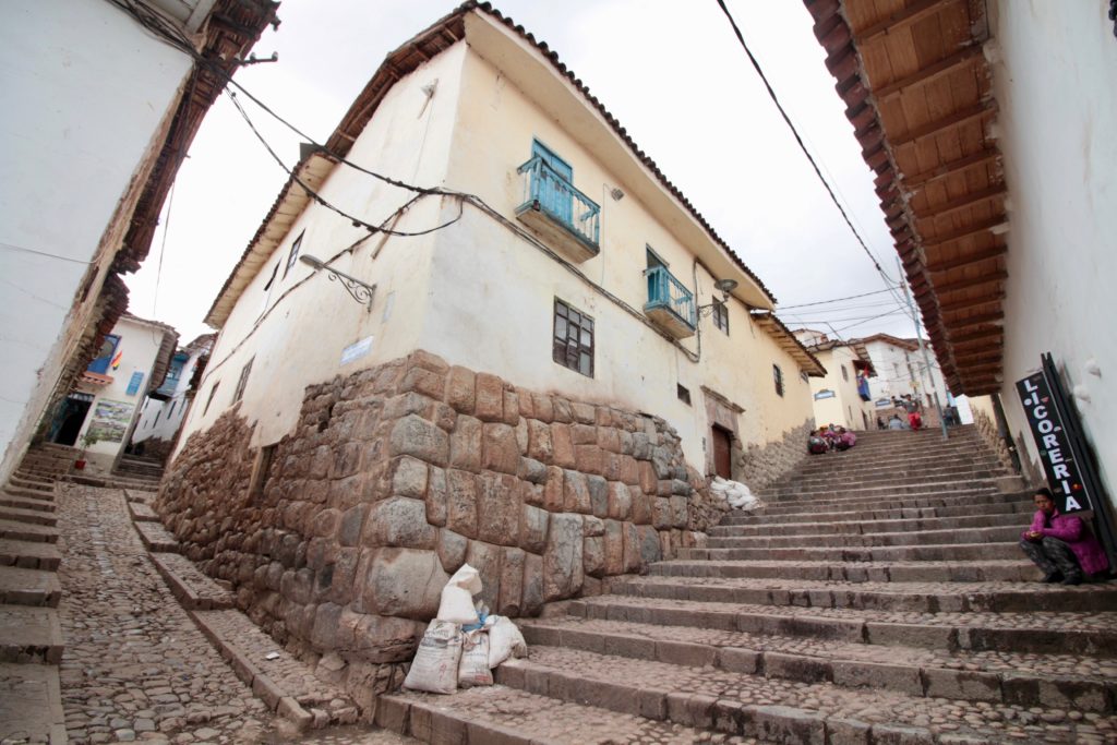 Typical street in old Cusco. Incan stonework is laid without mortar, yet withstands earthquakes and wars..