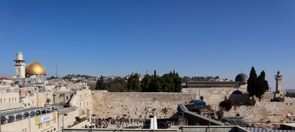 Temple Mount, gold Dome of Rock on left, Western Wall in middle, black domed Al Aqsa Mosque on right