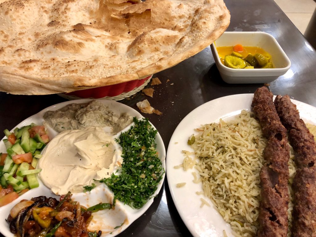 An interesting experience of kofta lamb over dill rice and sides, with men beside me on prayer mats praying towards Mecca while the Haj played in real time on big screen. Not a beer in sight, but otherwise you might say I got holy stuffed