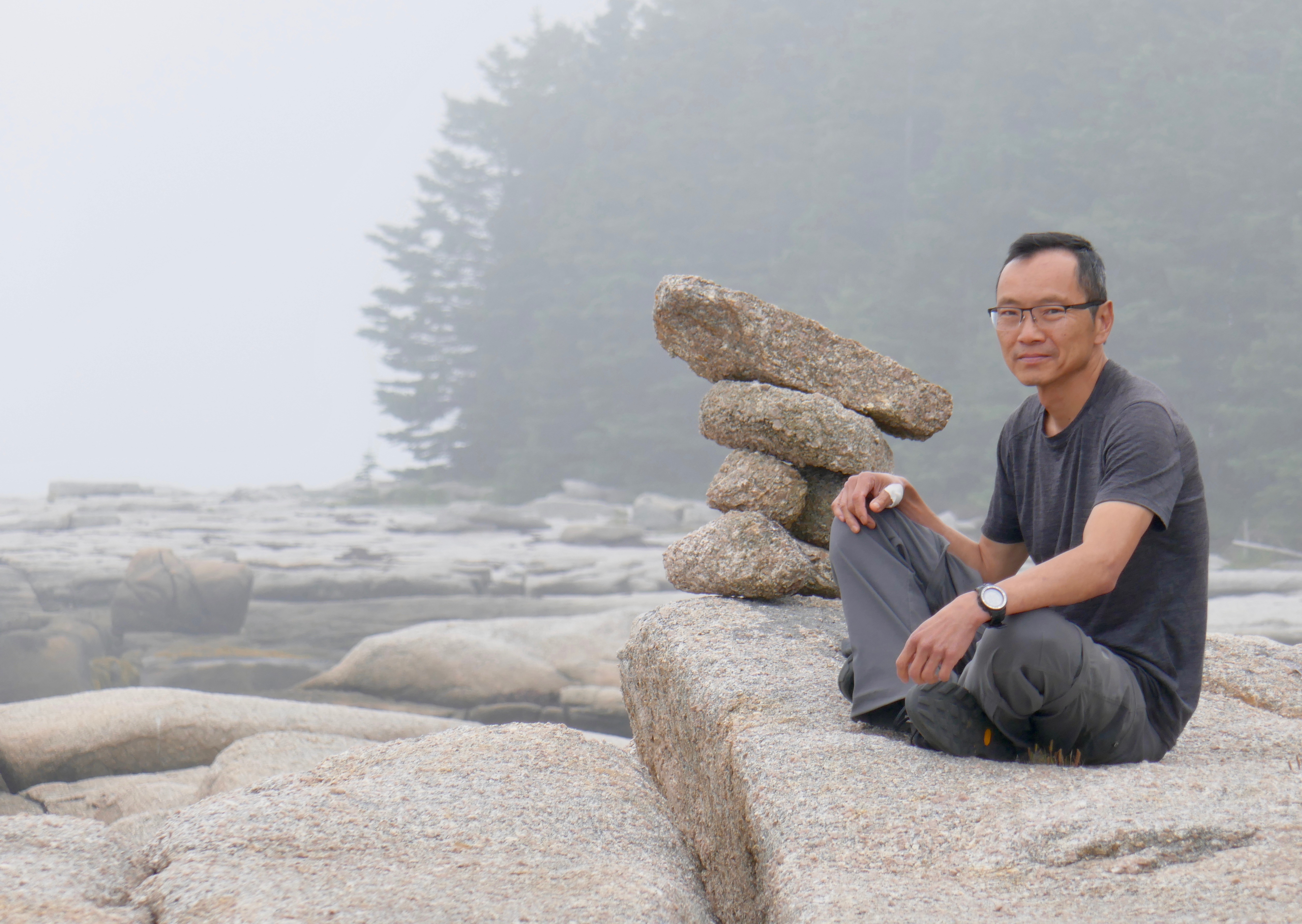 Picture of Wayne Ng on the rocks, Norton Island 2022