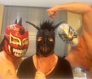 Wayne, Trish and Marc wearing their wrestling masks
