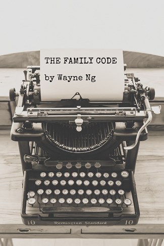 Old black and white typewriter with THE FAMIY CODE by Wayne Ng typed on a piece of paperof paper in