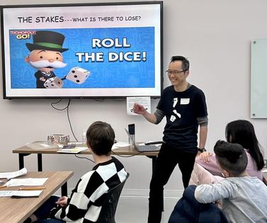 Wayne Ng teaching a writing workshop at the MASC Young Authors and Illustrators Festival on Feb 27, 2024