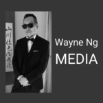 Wayne Ng Media Black and white picture of Wayne Ng in a suit and sunglasses